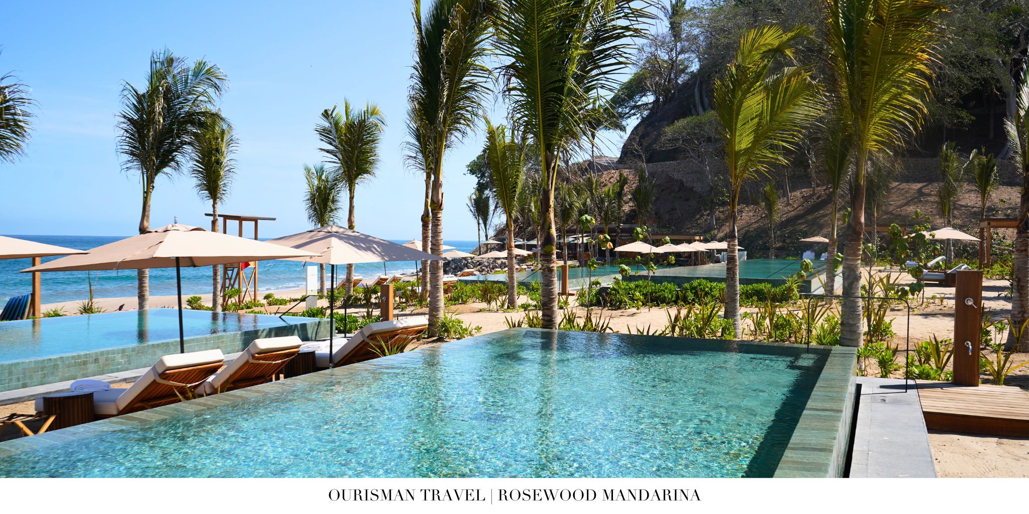 Rosewood Mandarina beachfront pool surrounded by tropical gardens and lounge areas