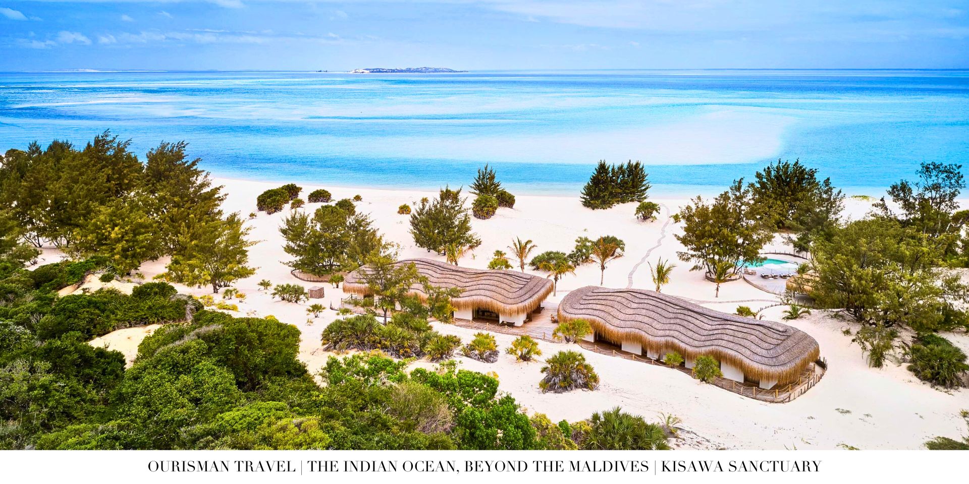 Aerial view of untouched Mozambique coastline with boutique beachfront retreat