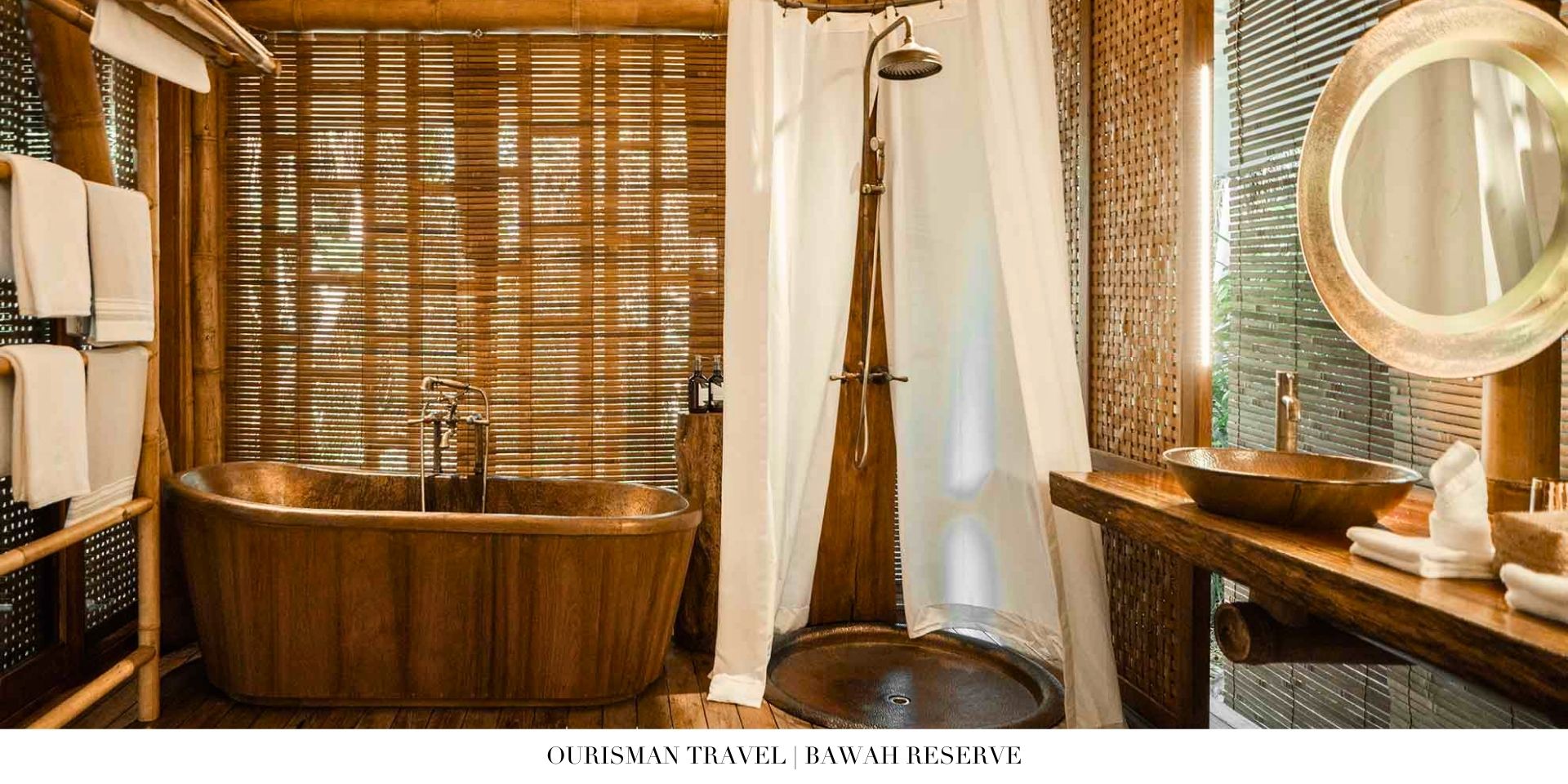 Spa-inspired bathroom at Bawah Reserve with freestanding soaking tub and open-air design