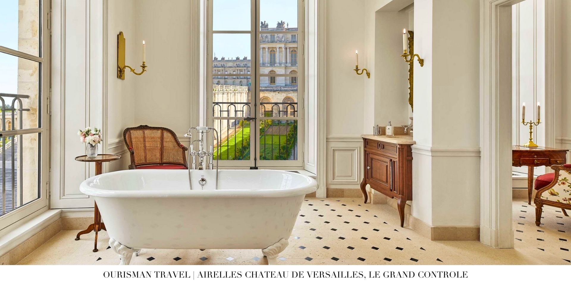Opulent bathroom at Le Grand Contrôle with marble finishes, soaking tub, and gilded accents
