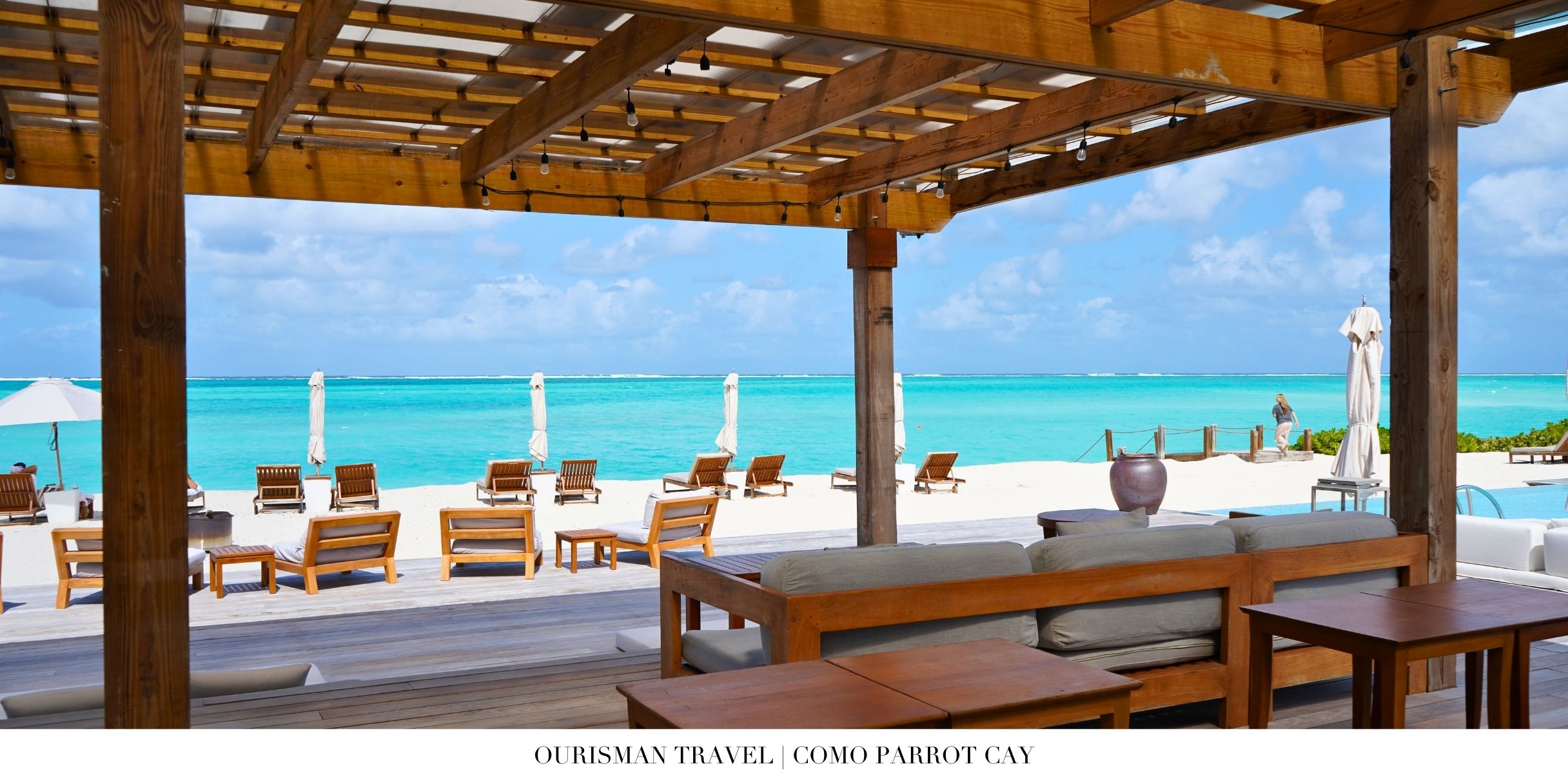 Open-air dining pavilion at COMO Parrot Cay overlooking the ocean in Turks and Caicos