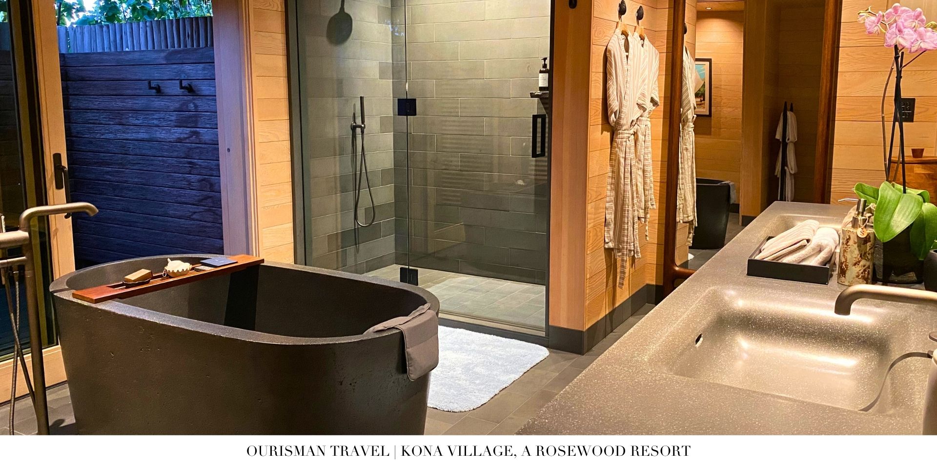 Open-air bathroom at Kona Village with soaking tub, natural materials, and garden views