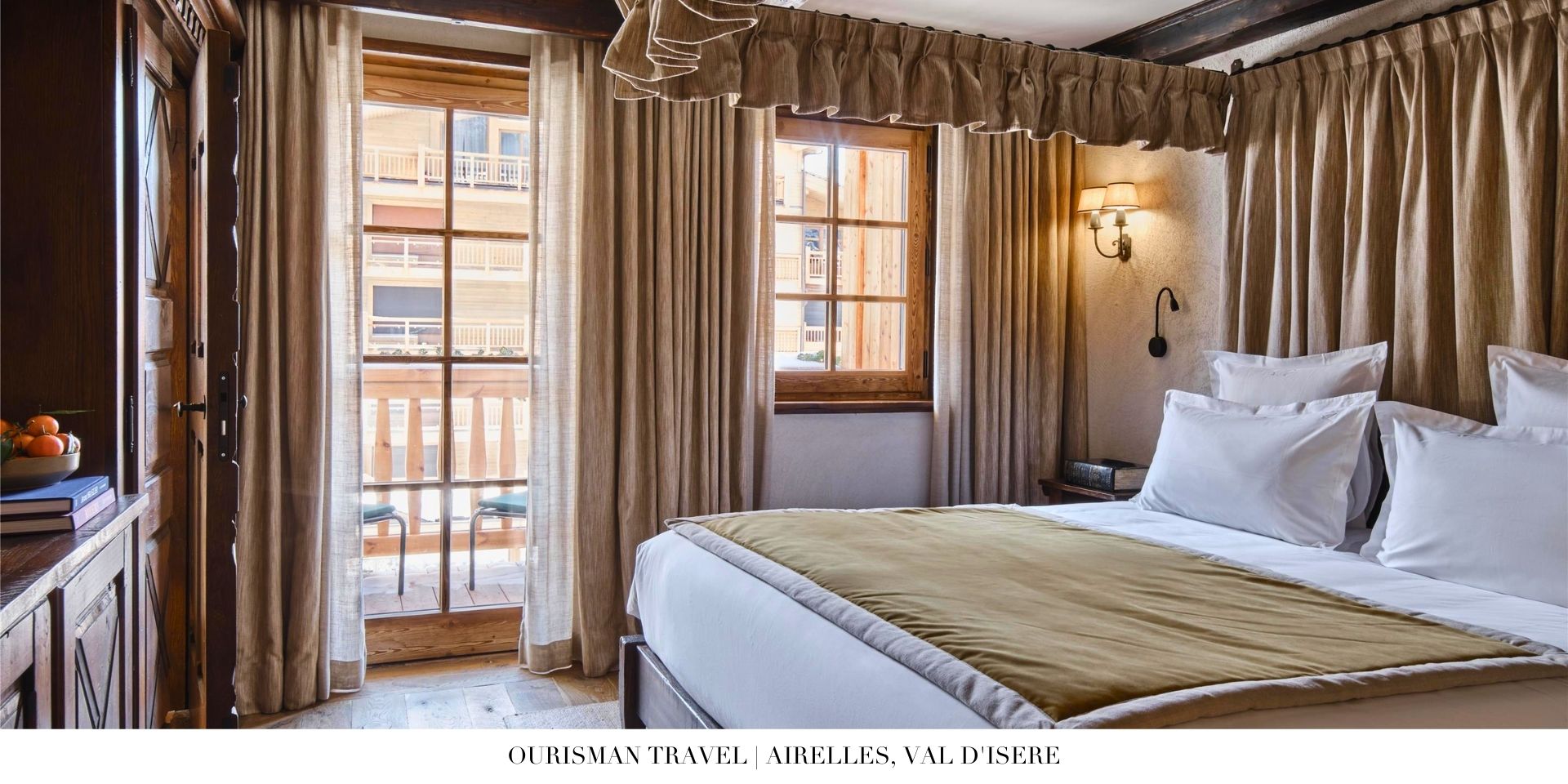 Luxury guest bedroom at Airelles, Val d’Isère with cozy alpine décor and mountain views