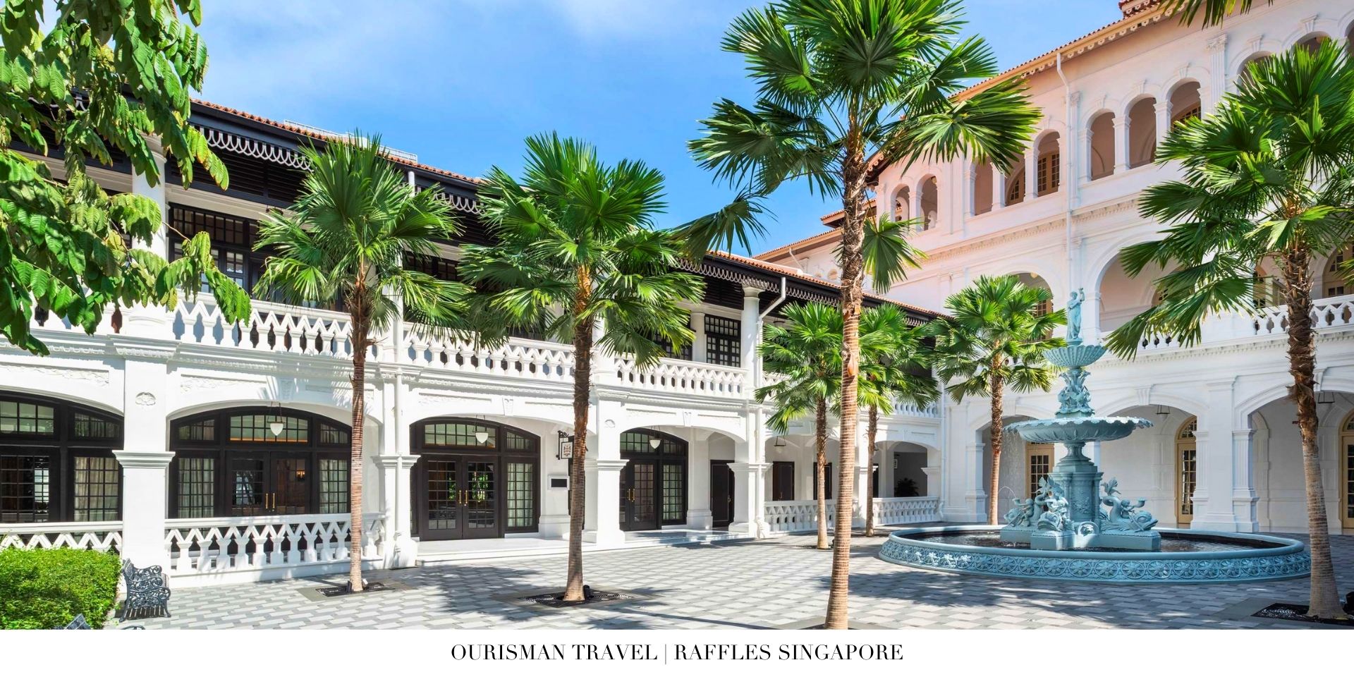 Raffles Singapore courtyard garden with tropical plants and tranquil seating areas