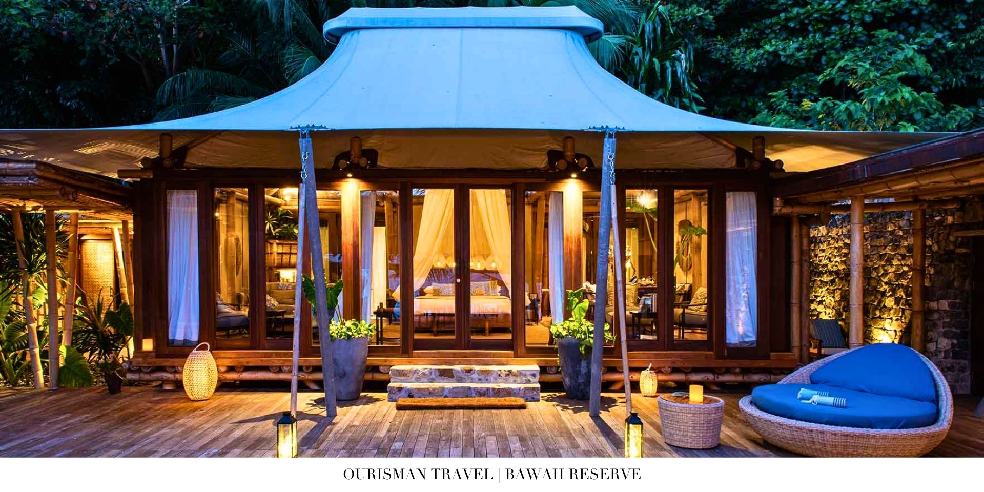 Serene bedroom at Bawah Reserve featuring natural wood finishes and panoramic island views