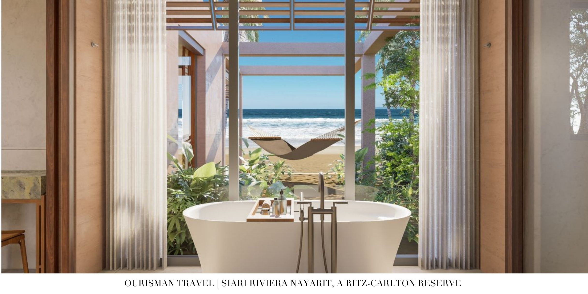 Freestanding soaking tub with ocean view at Sīari Ritz-Carlton Reserve