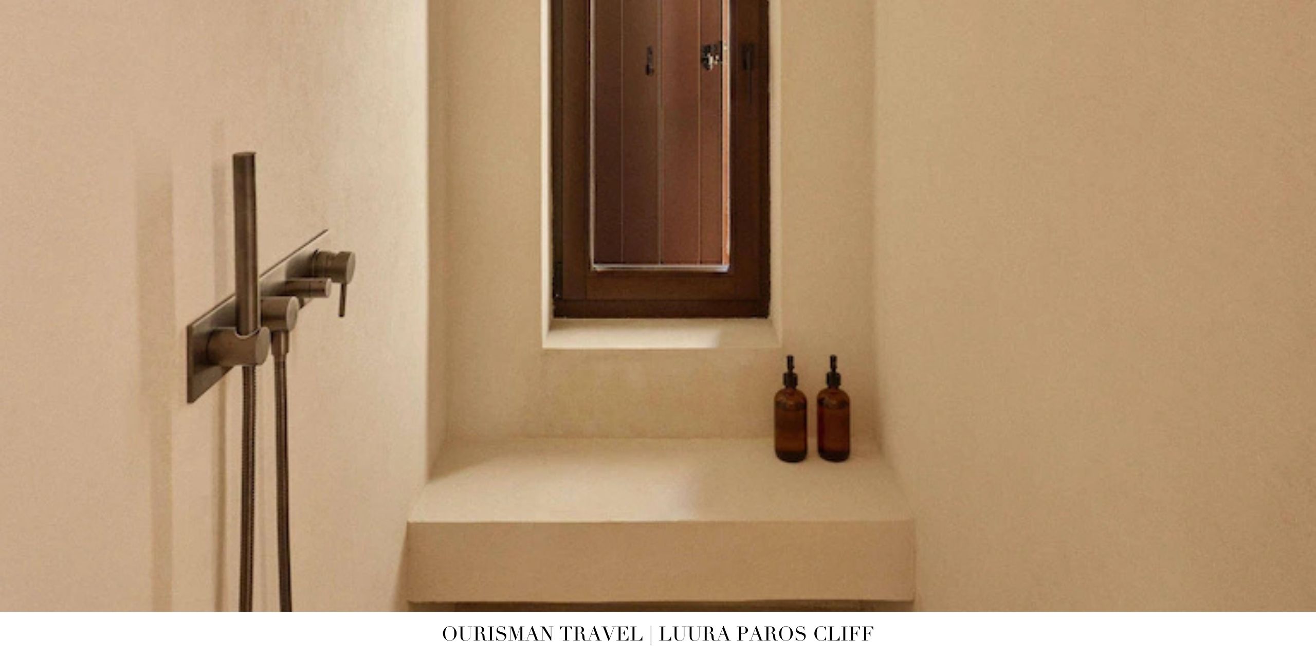 Spa-inspired bathroom with freestanding tub at Luura Paros Cliff