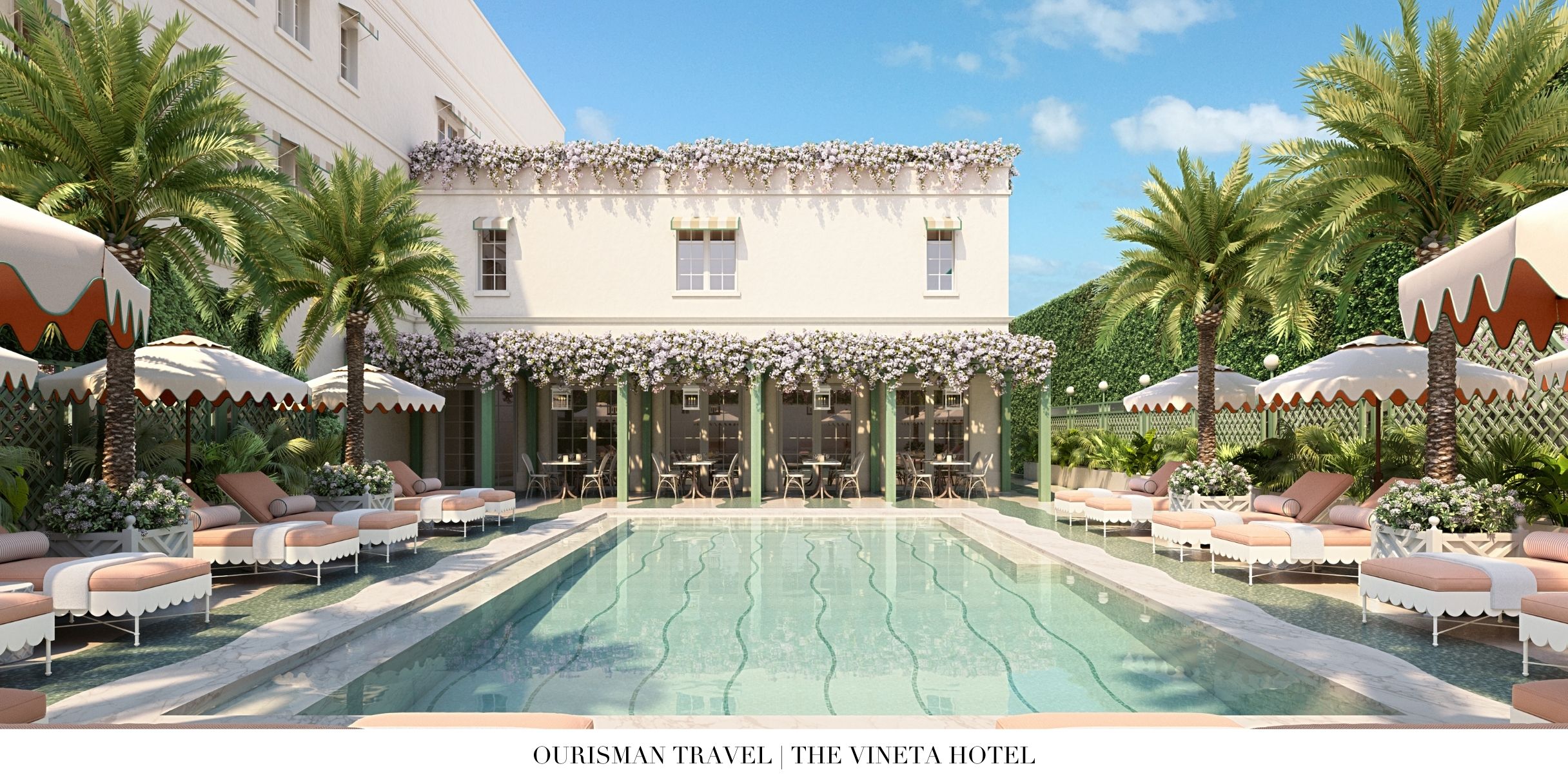 Pool area surrounded by palms at The Vineta Palm Beach
