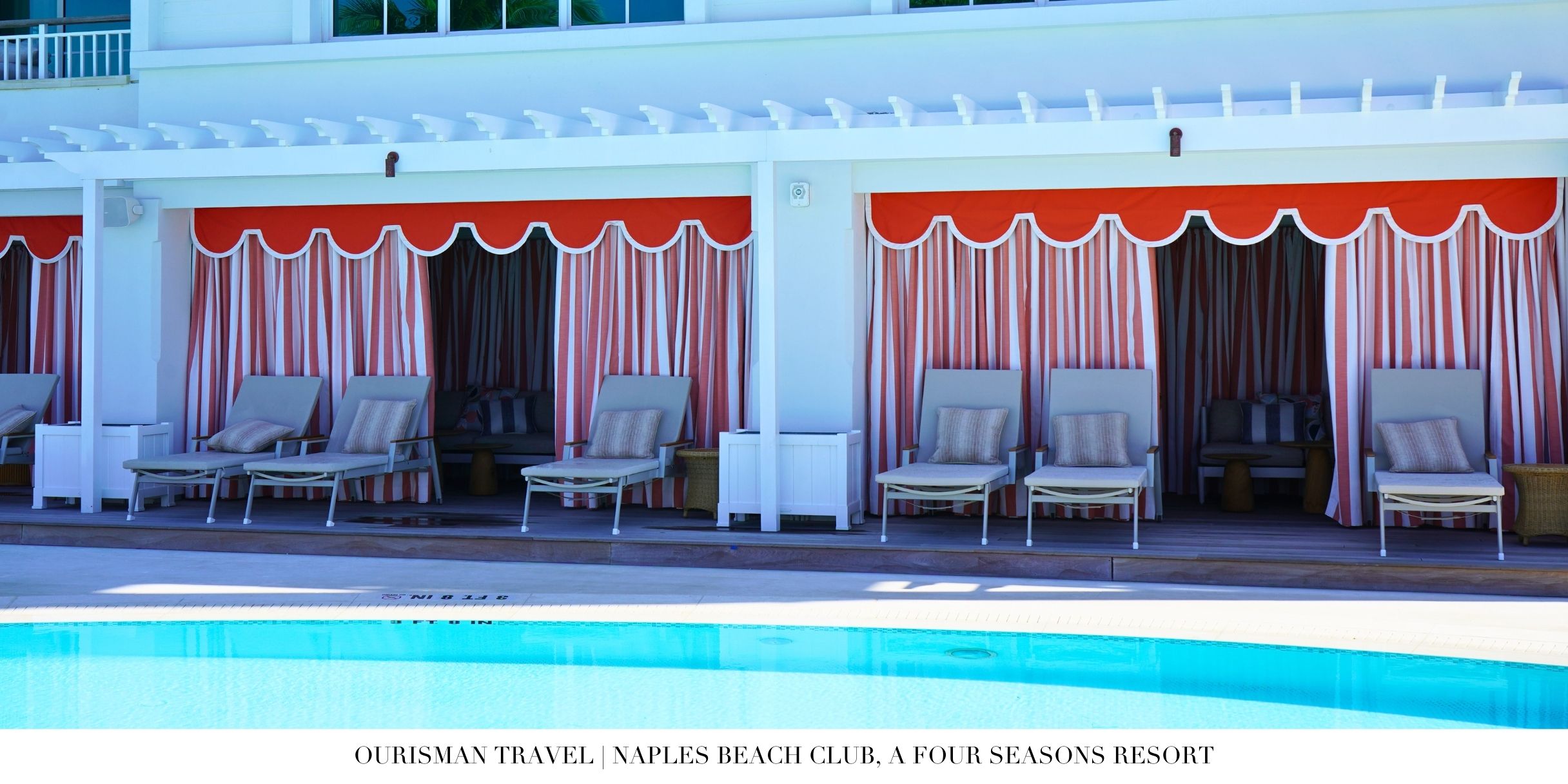 Poolside cabanas and loungers at Naples Beach Club Four Seasons