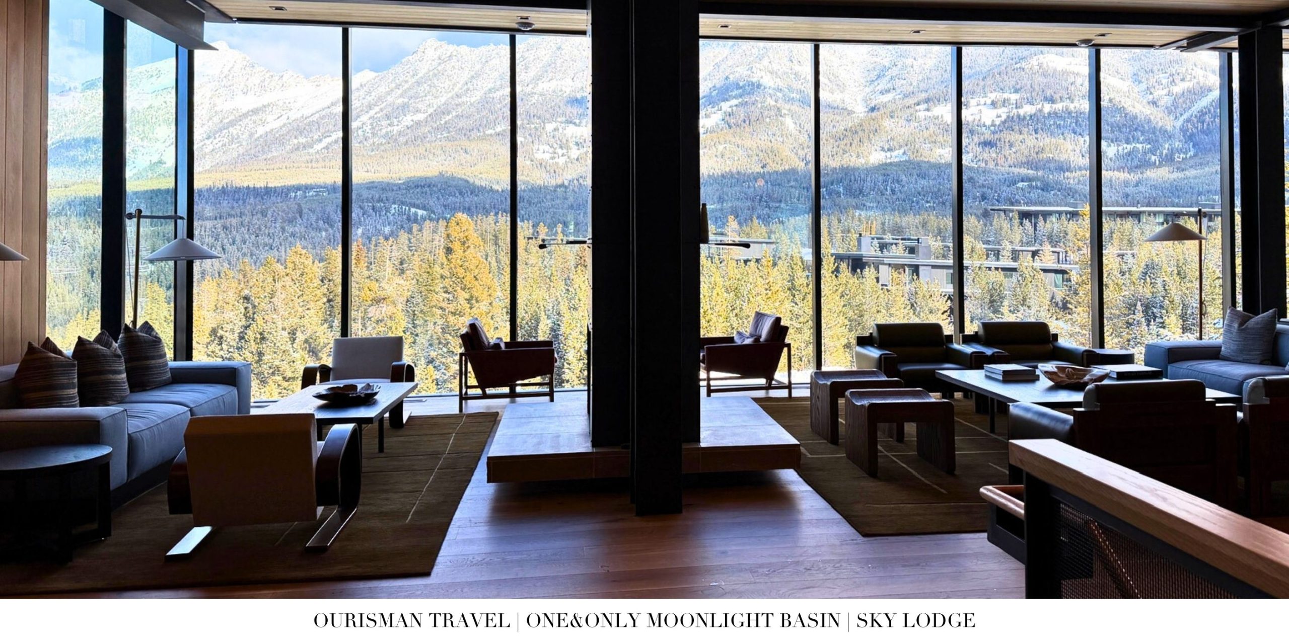 Cozy lounge seating inside Sky Lodge at One&Only Moonlight Basin overlooking snow-covered Montana mountains.