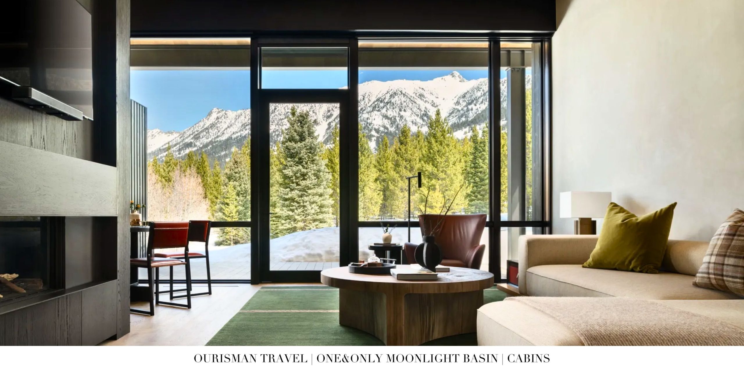 Spacious living room inside a cabin at One&Only Moonlight Basin with vaulted ceilings, stone fireplace, and warm timber finishes.