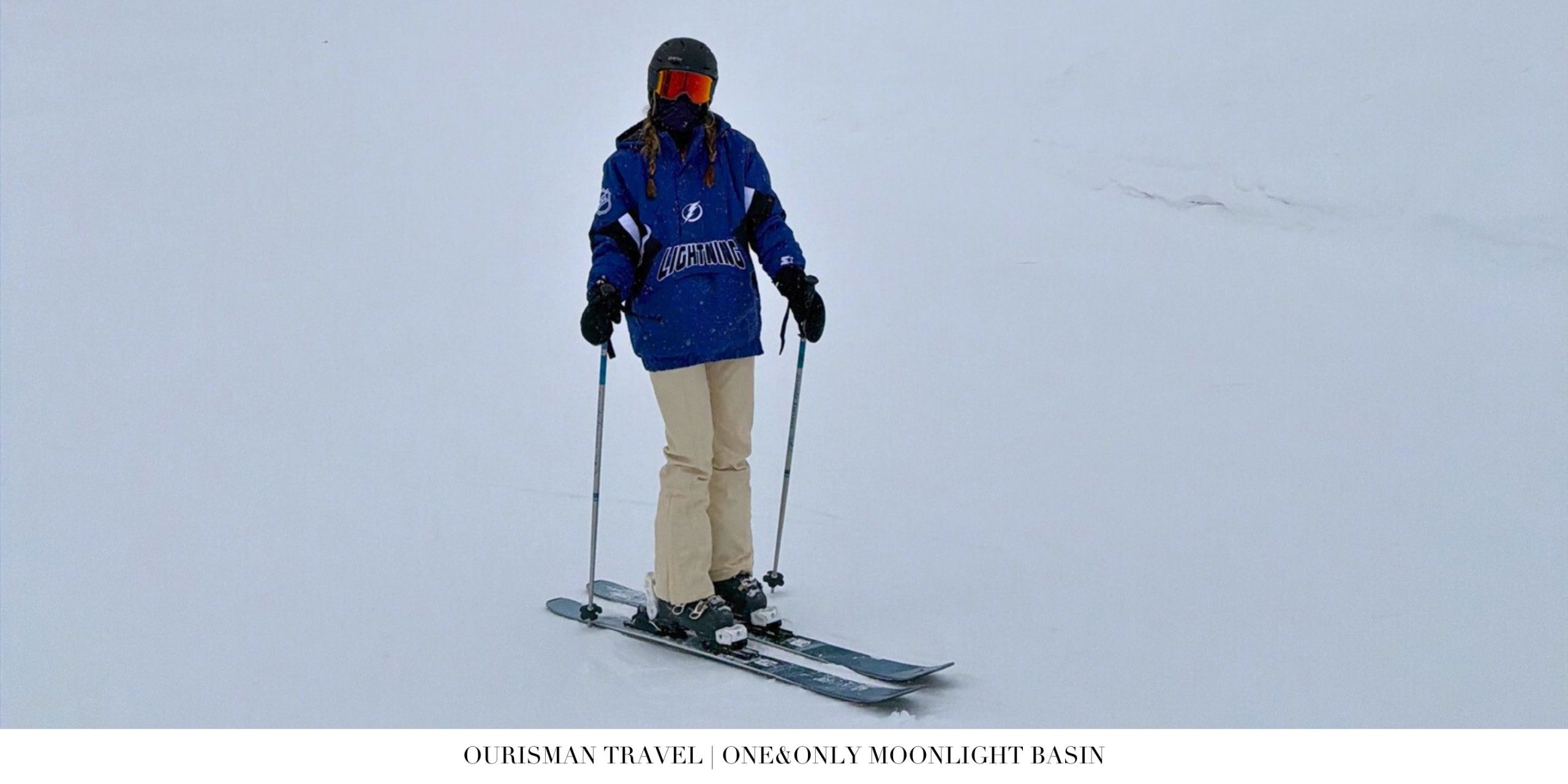 Guests skiing down powder-covered slopes near One&Only Moonlight Basin with views of Lone Peak in winter.
