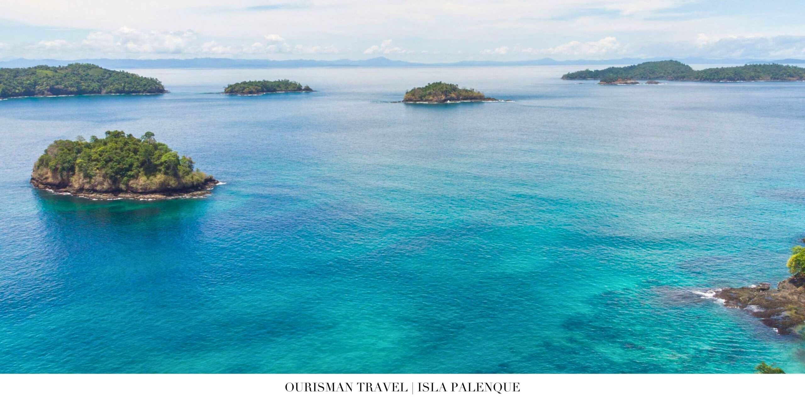 Beachfront lounge at Isla Palenque Resort with soft white sand and turquoise water