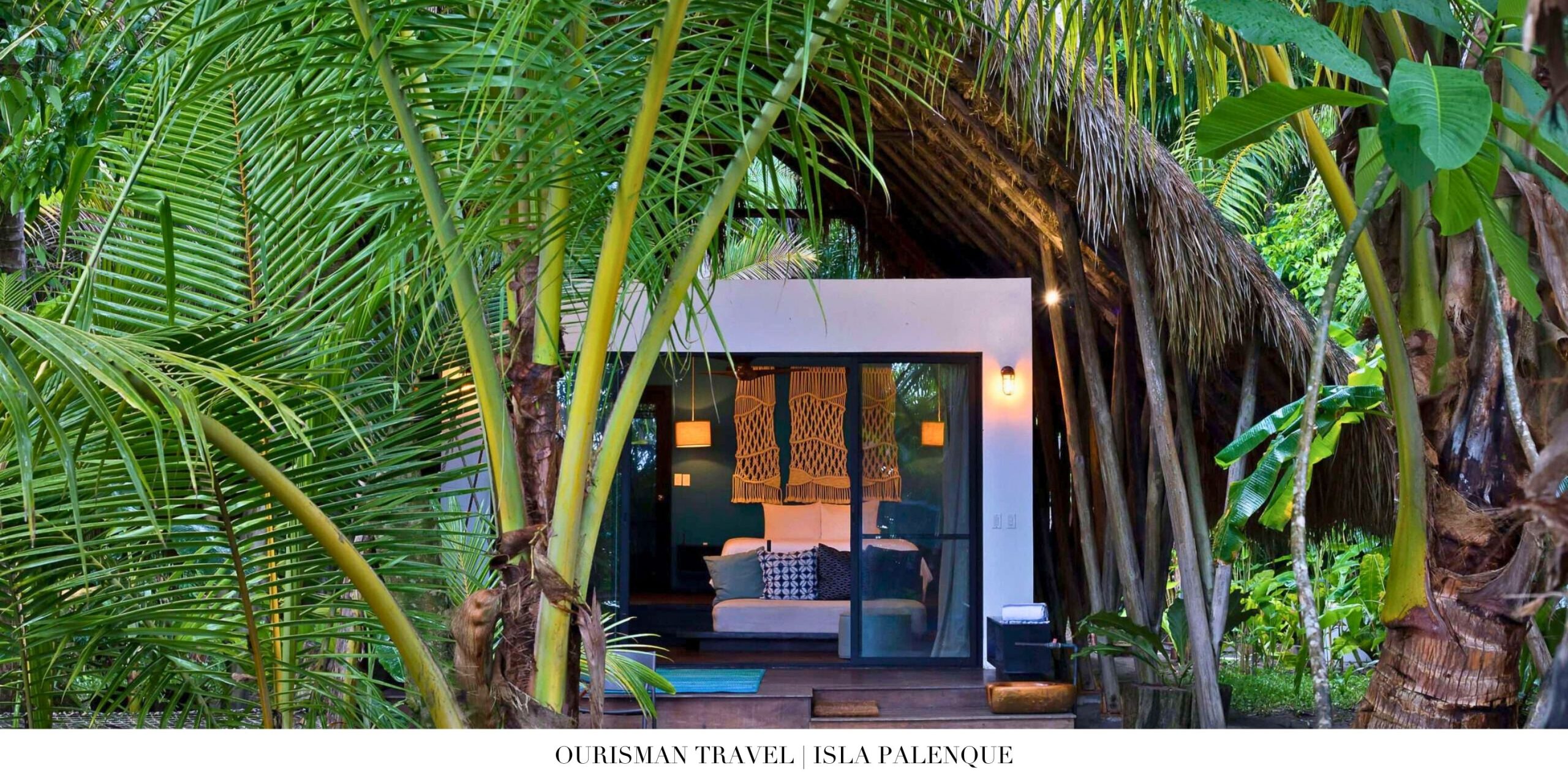 Exterior view of a luxury villa at Isla Palenque Resort surrounded by lush jungle and overlooking the ocean