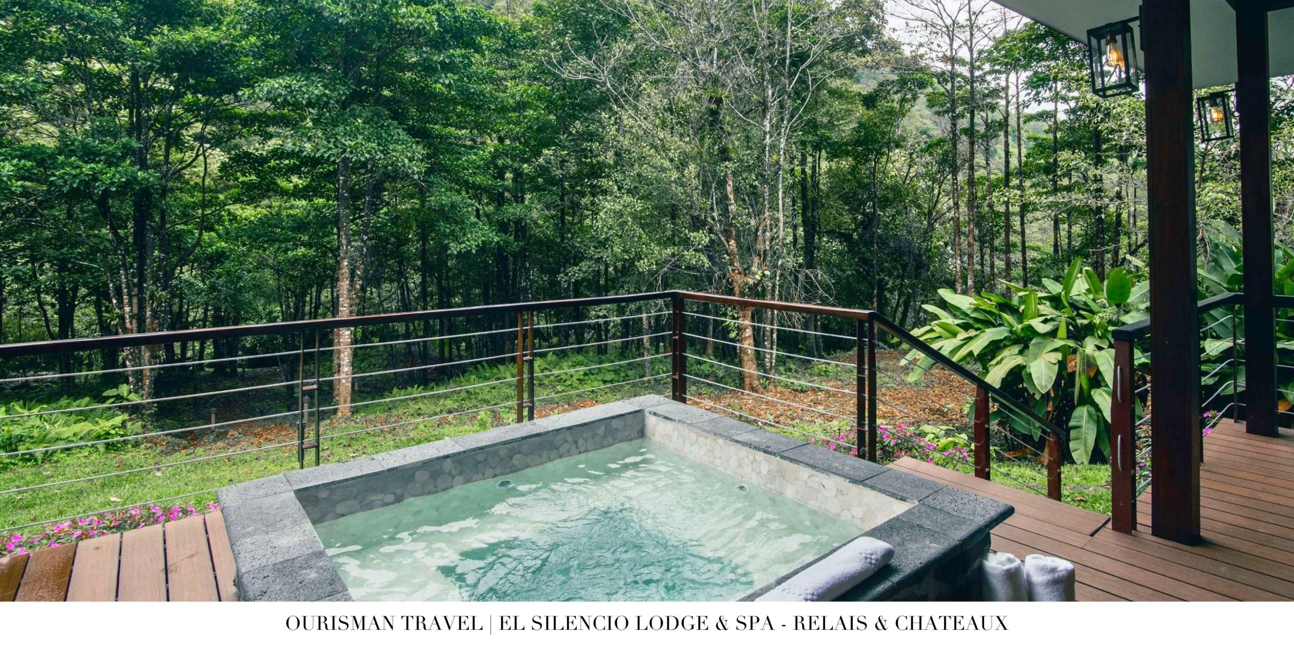 Infinity pool overlooking lush rainforest at El Silencio Lodge & Spa