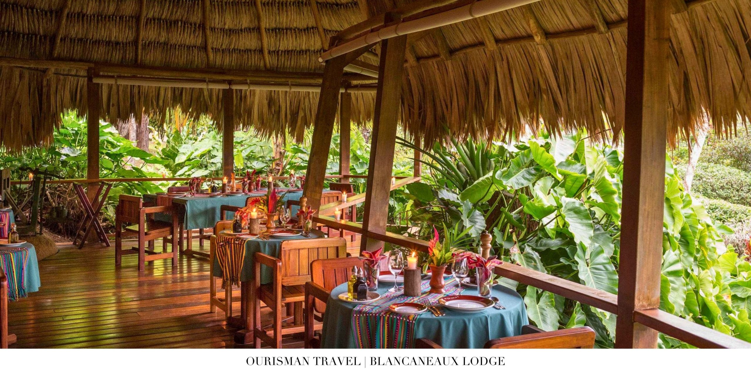 Dining experience at Blancaneaux Lodge with panoramic rainforest backdrop