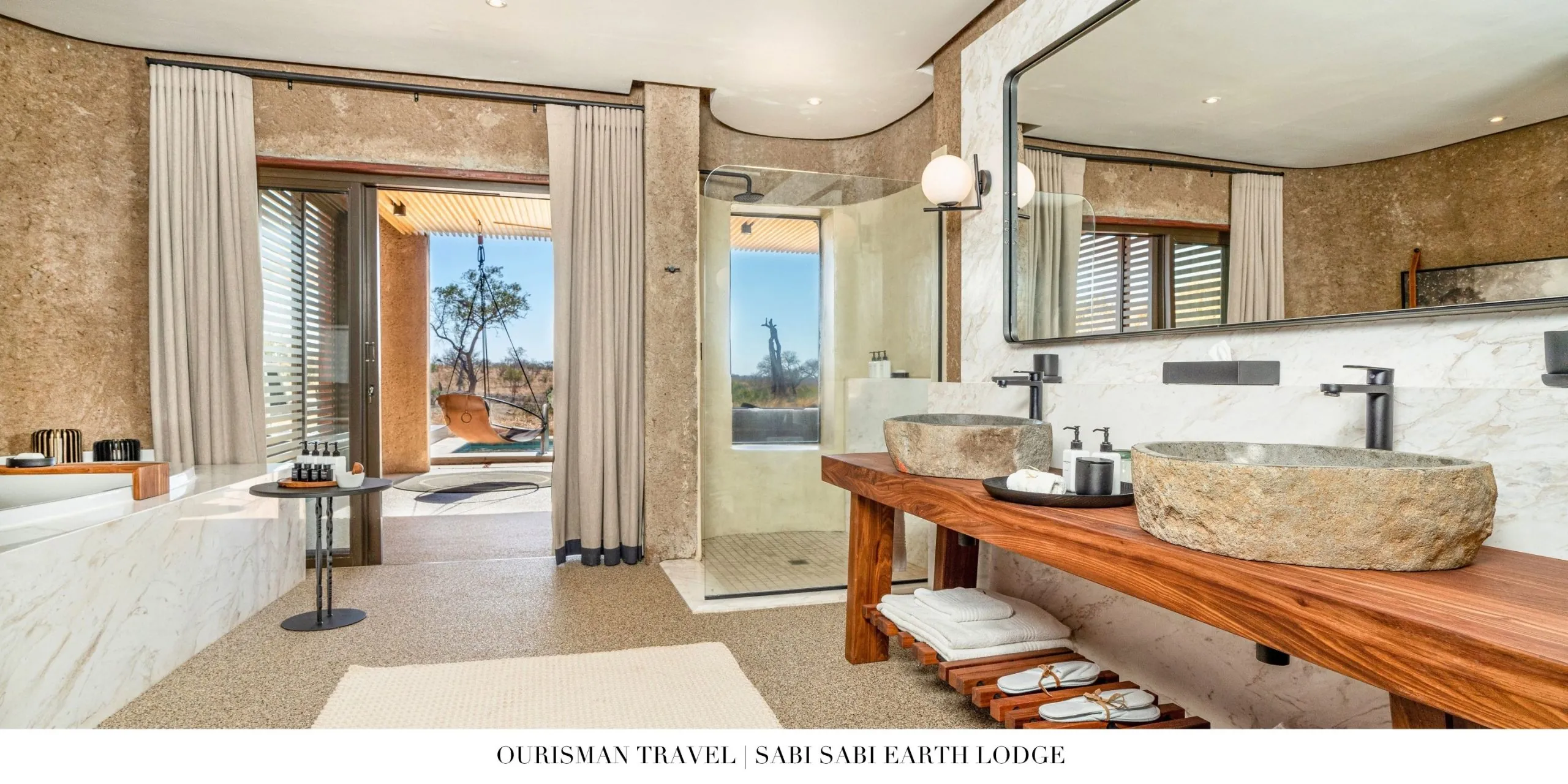 Elegant bathroom with tub in Sabi Sabi Earth Lodge suite