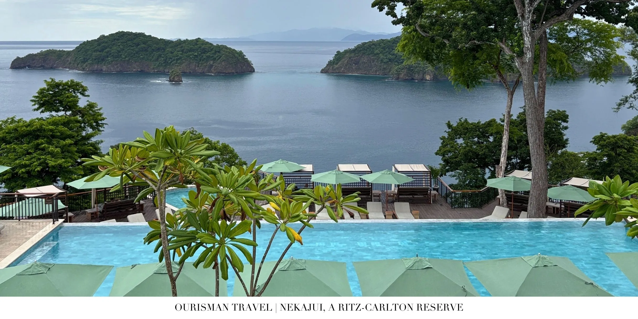 Infinity-edge pool with panoramic ocean views at Nekajui Ritz-Carlton Reserve