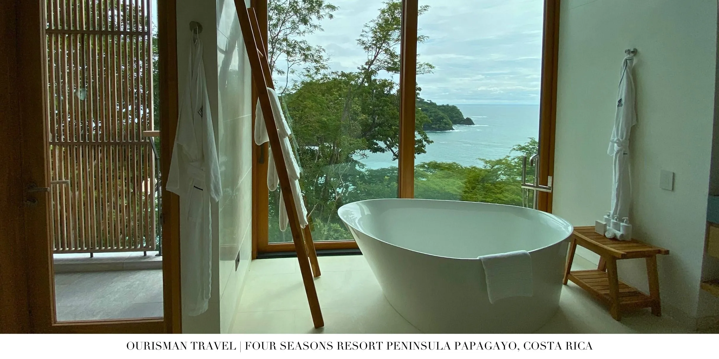Marble bathroom with deep soaking tub and walk-in shower at Four Seasons Costa Rica