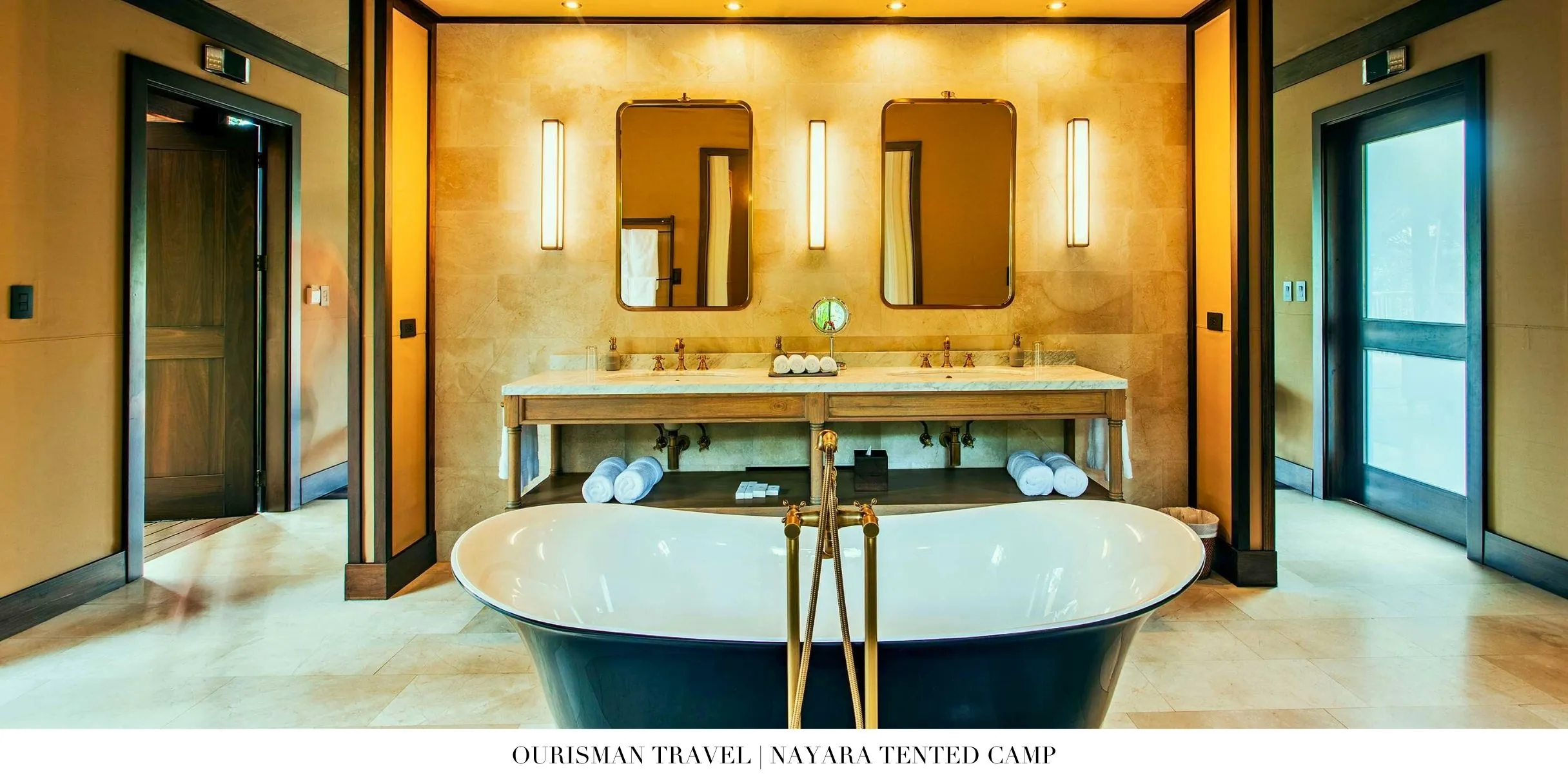Open-air bathroom with soaking tub and rainforest views at Nayara Tented Camp