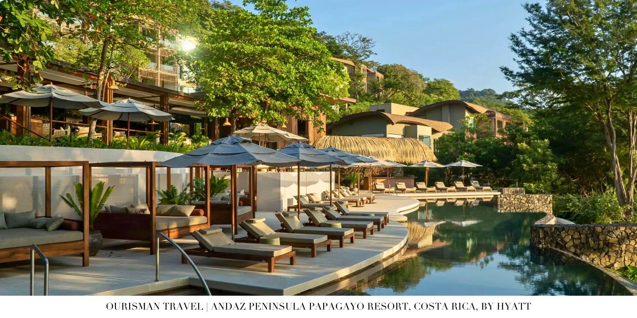Family pool surrounded by tropical landscape at Andaz Costa Rica Resort