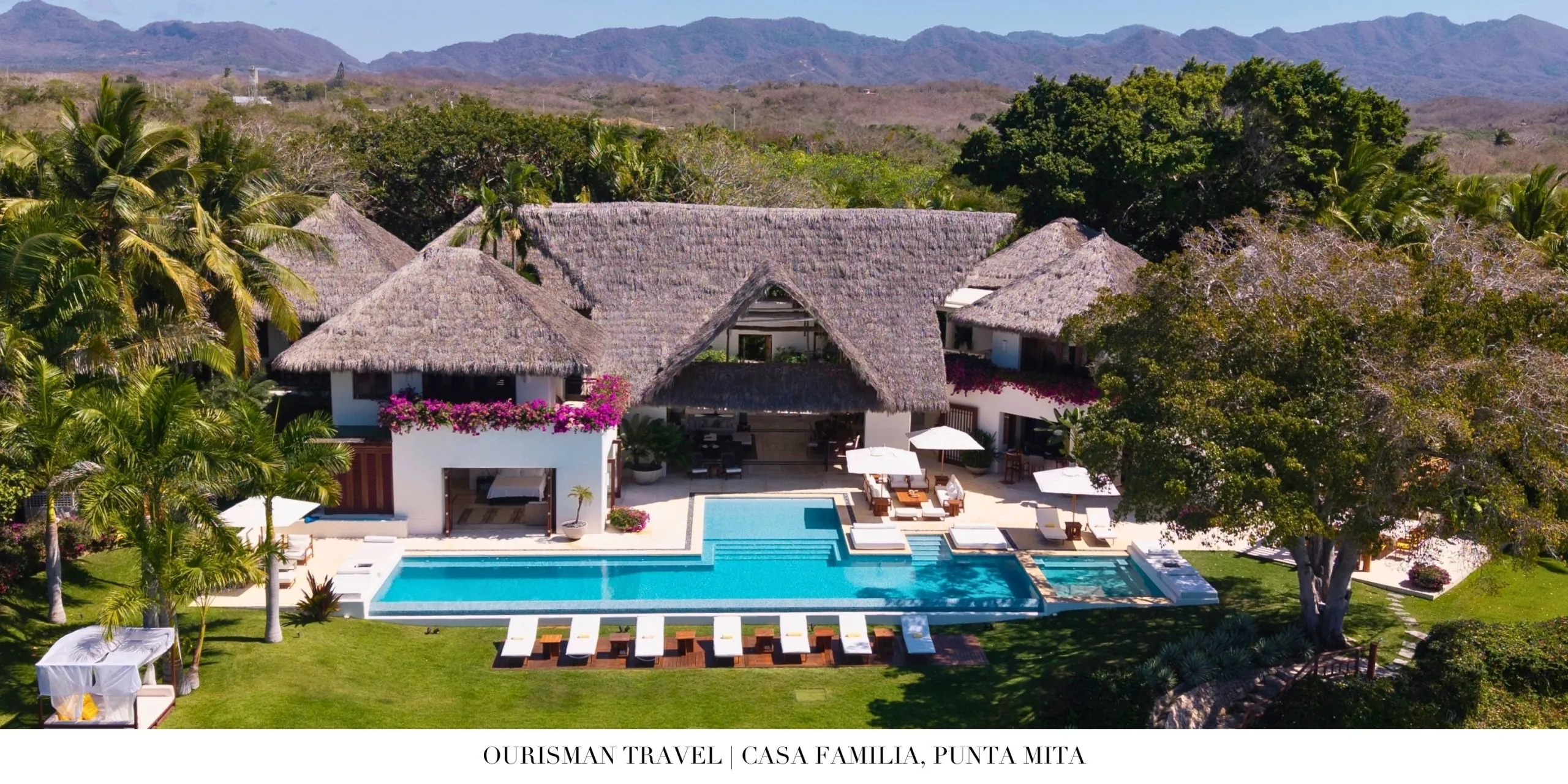 Exterior of Casa Familia villa in Punta Mita with tropical gardens