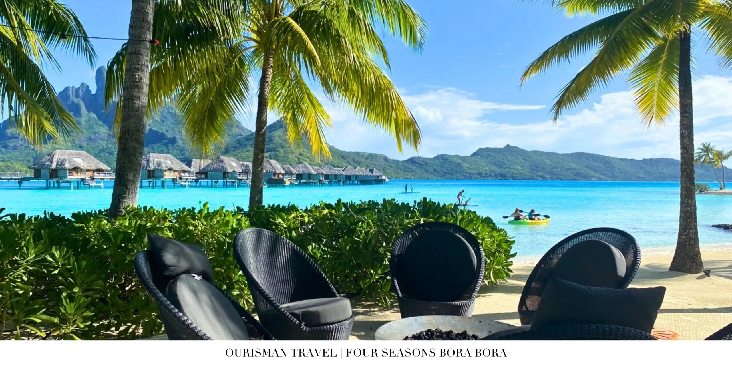 Vibrant turquoise lagoon surrounding Four Seasons Resort Bora Bora