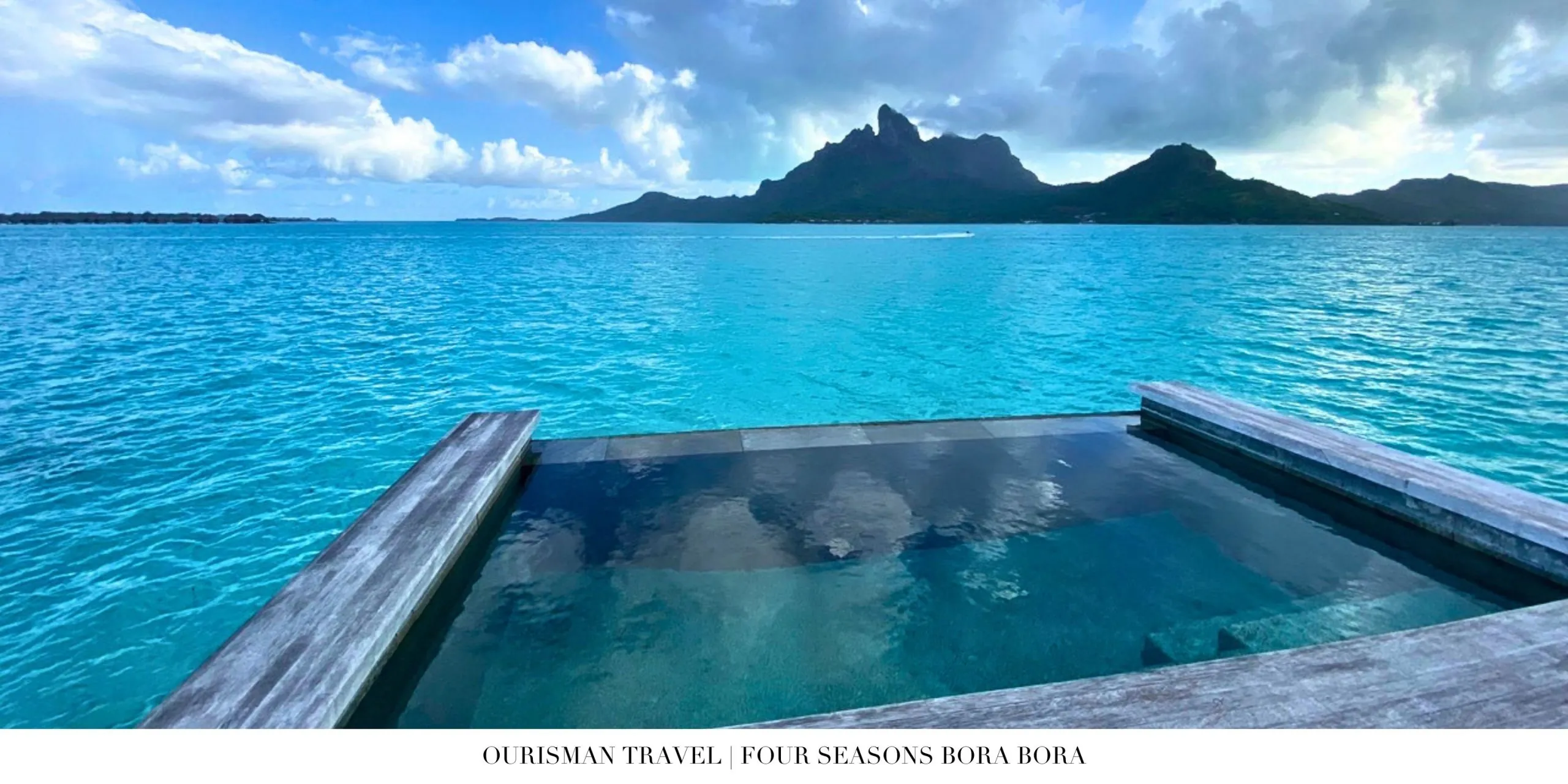 Private deck with ocean access at Four Seasons Bora Bora