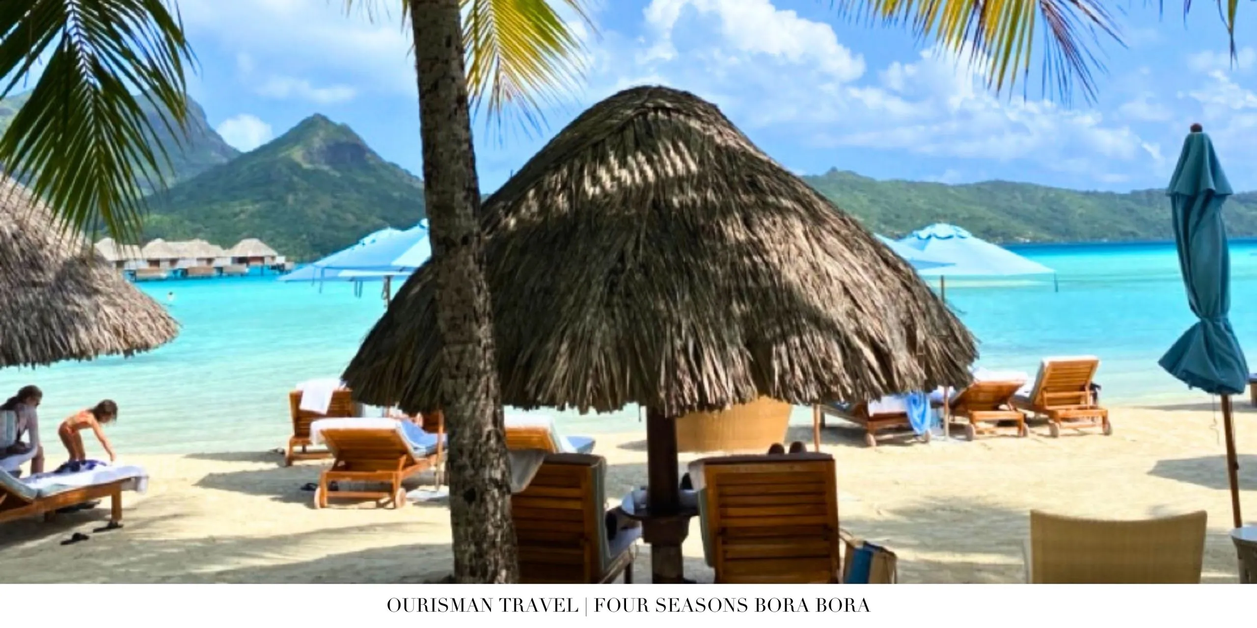 Palm-lined beach at Four Seasons Bora Bora