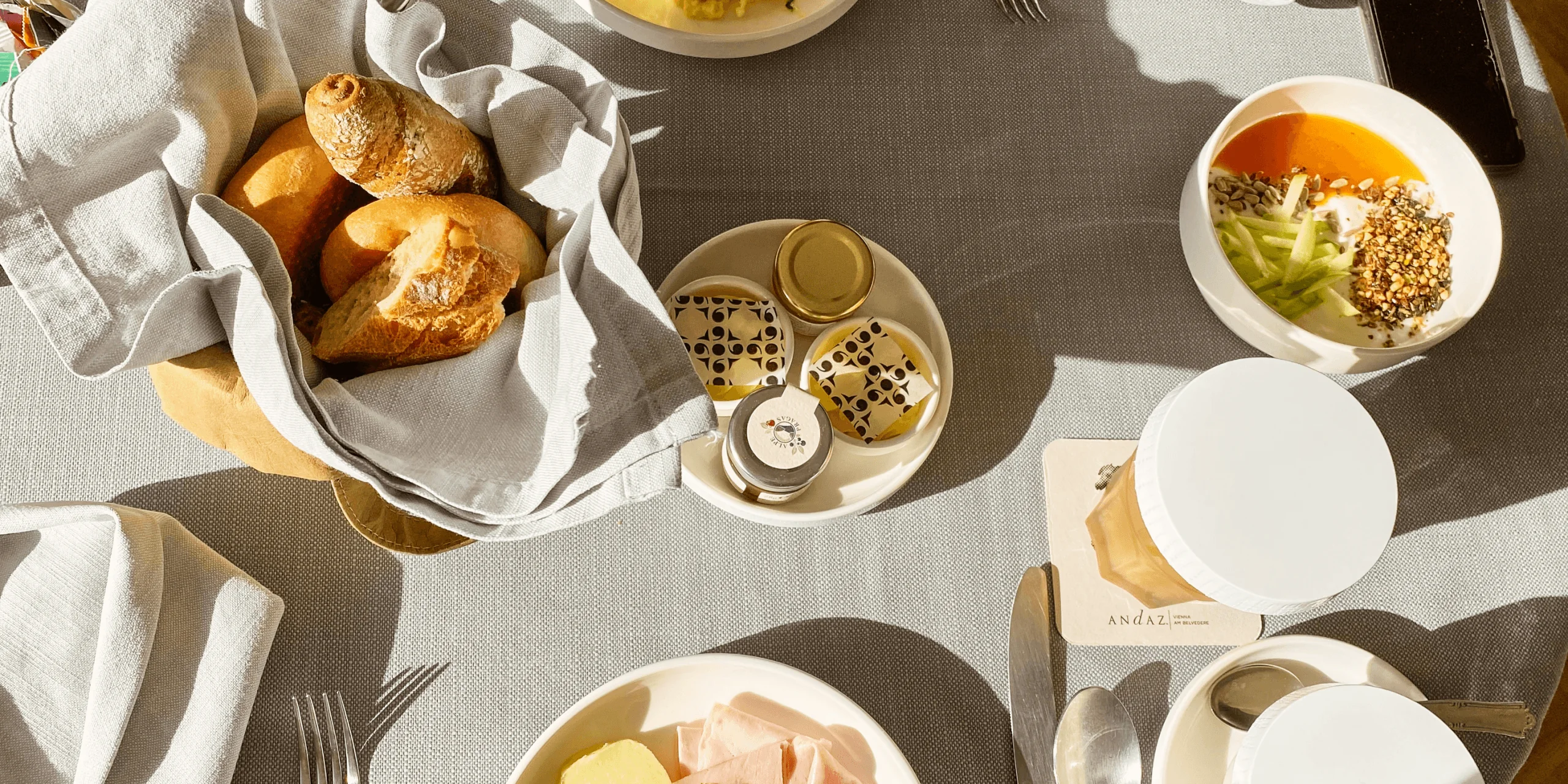 Breakfast spread with pastries coffee and fruit