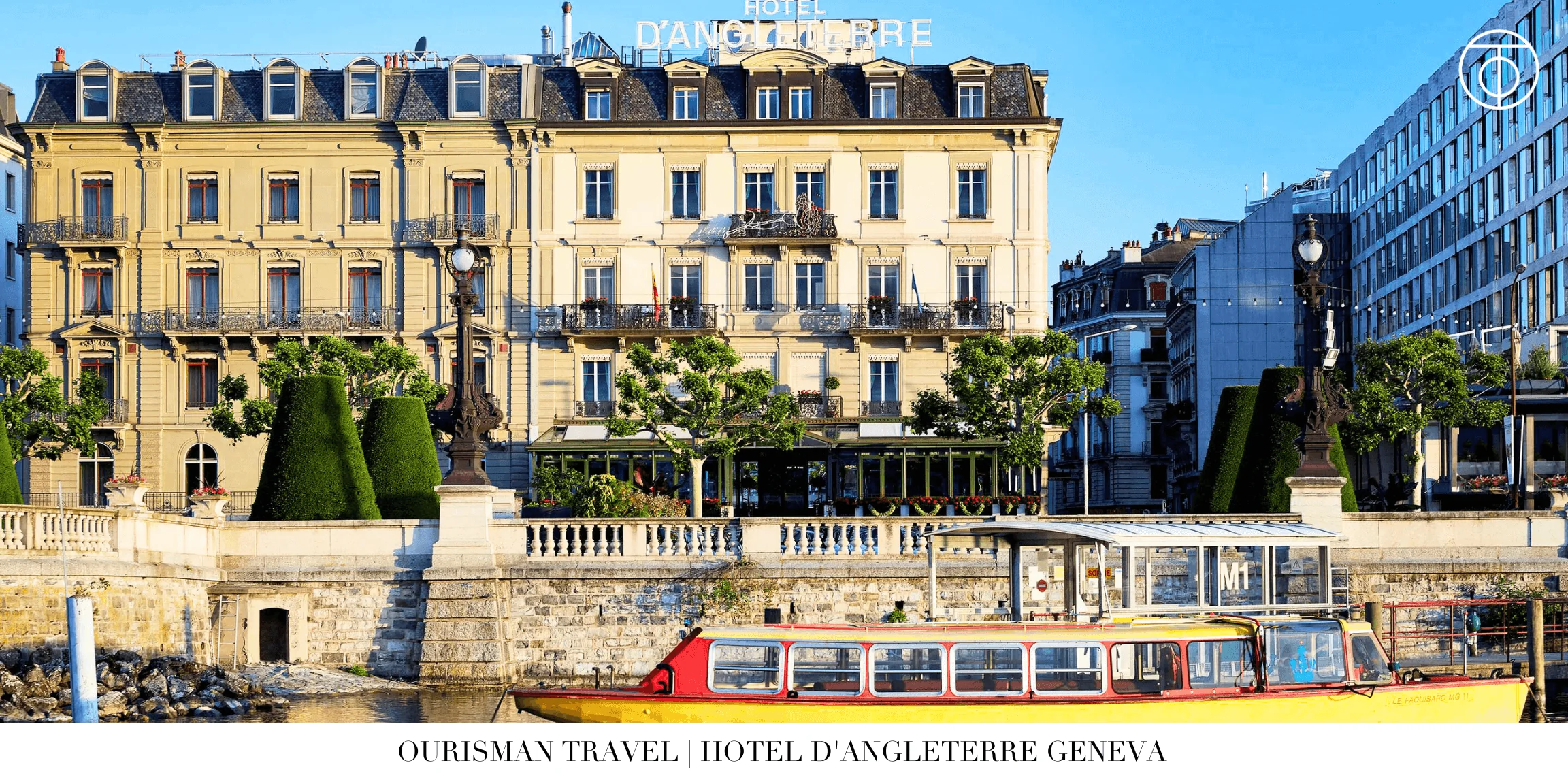 Exterior of Hotel d’Angleterre Geneva overlooking the waterfront in Switzerland