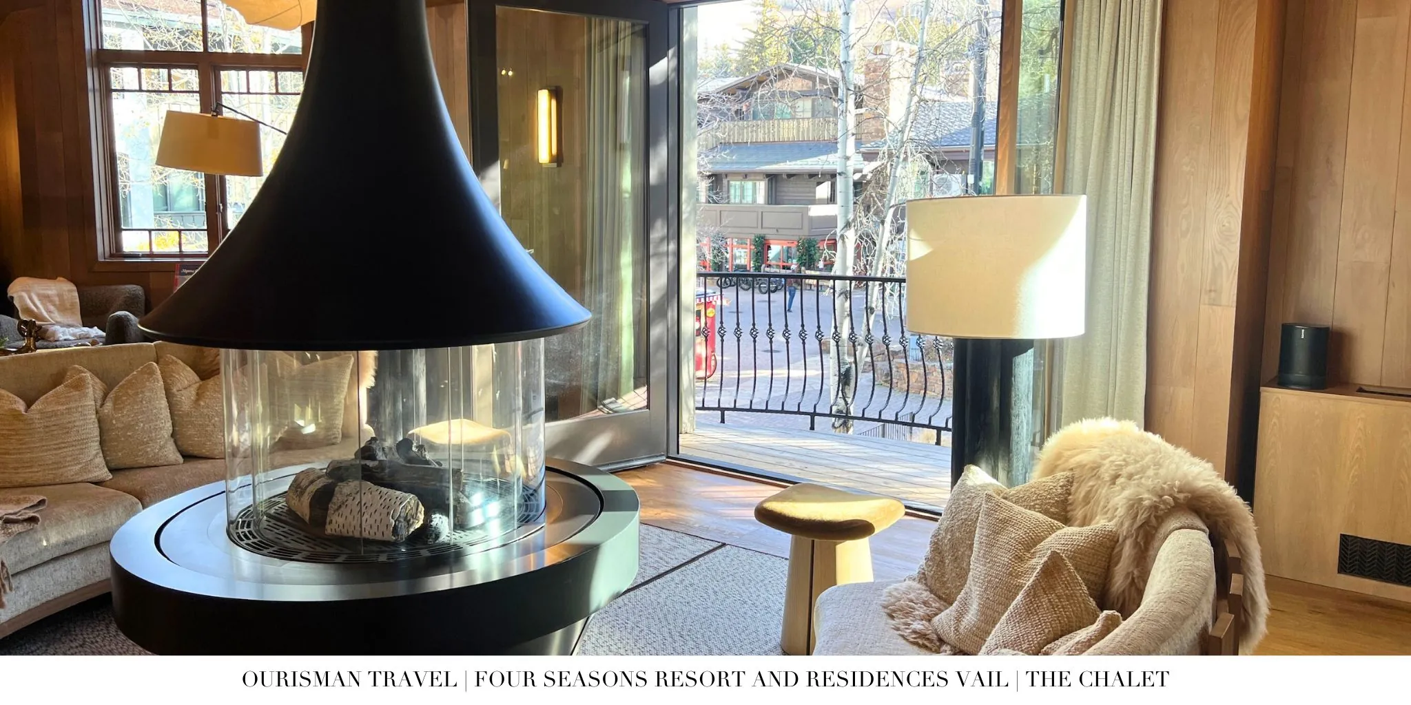Fireplace seating area inside The Chalet at Four Seasons Vail