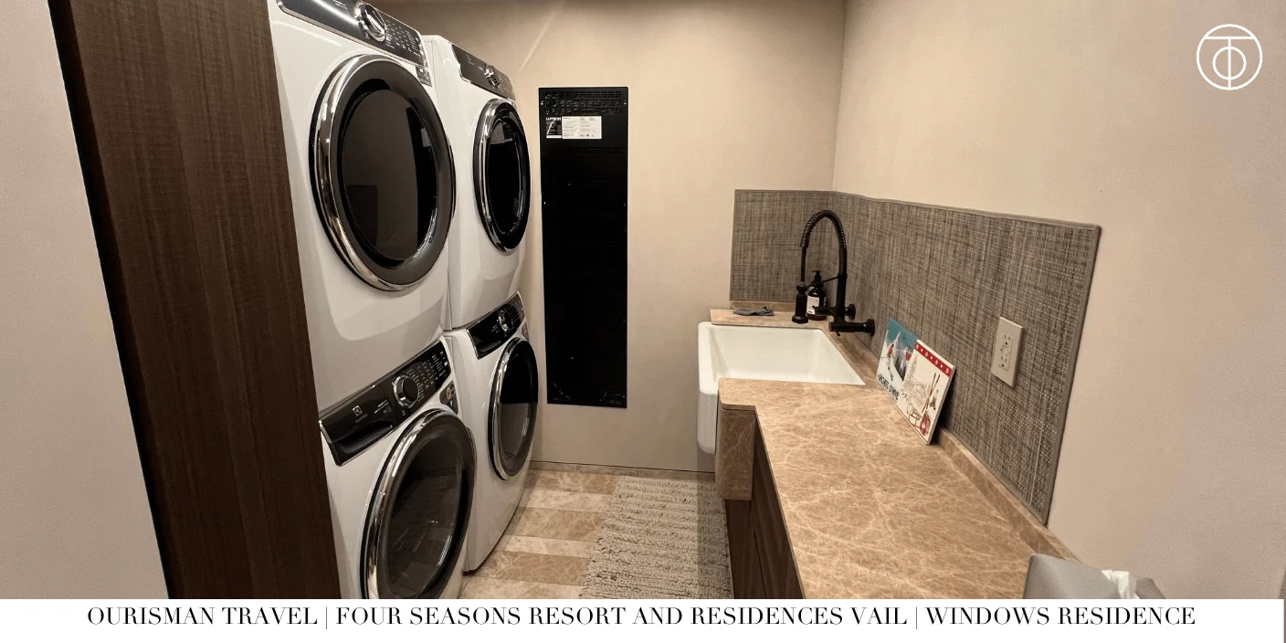 Private laundry room with washer and dryer at Windows Private Residence