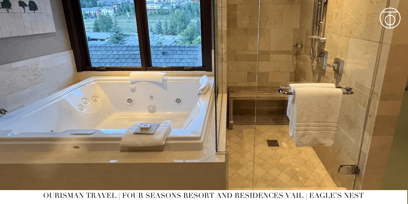 Eagles Nest Private Residence primary bathroom with soaking tub and mountain views at Four Seasons Vail