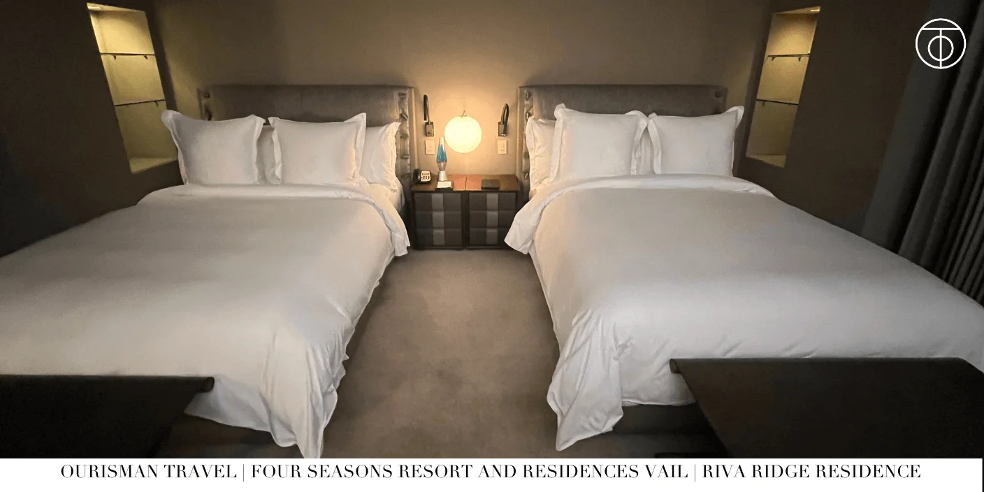 Riva Ridge Private Residence double bedroom with two beds and alpine décor at Four Seasons Vail