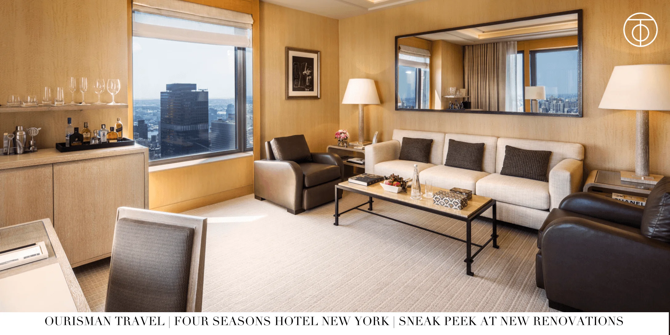Living area in a suite at Four Seasons Hotel New York