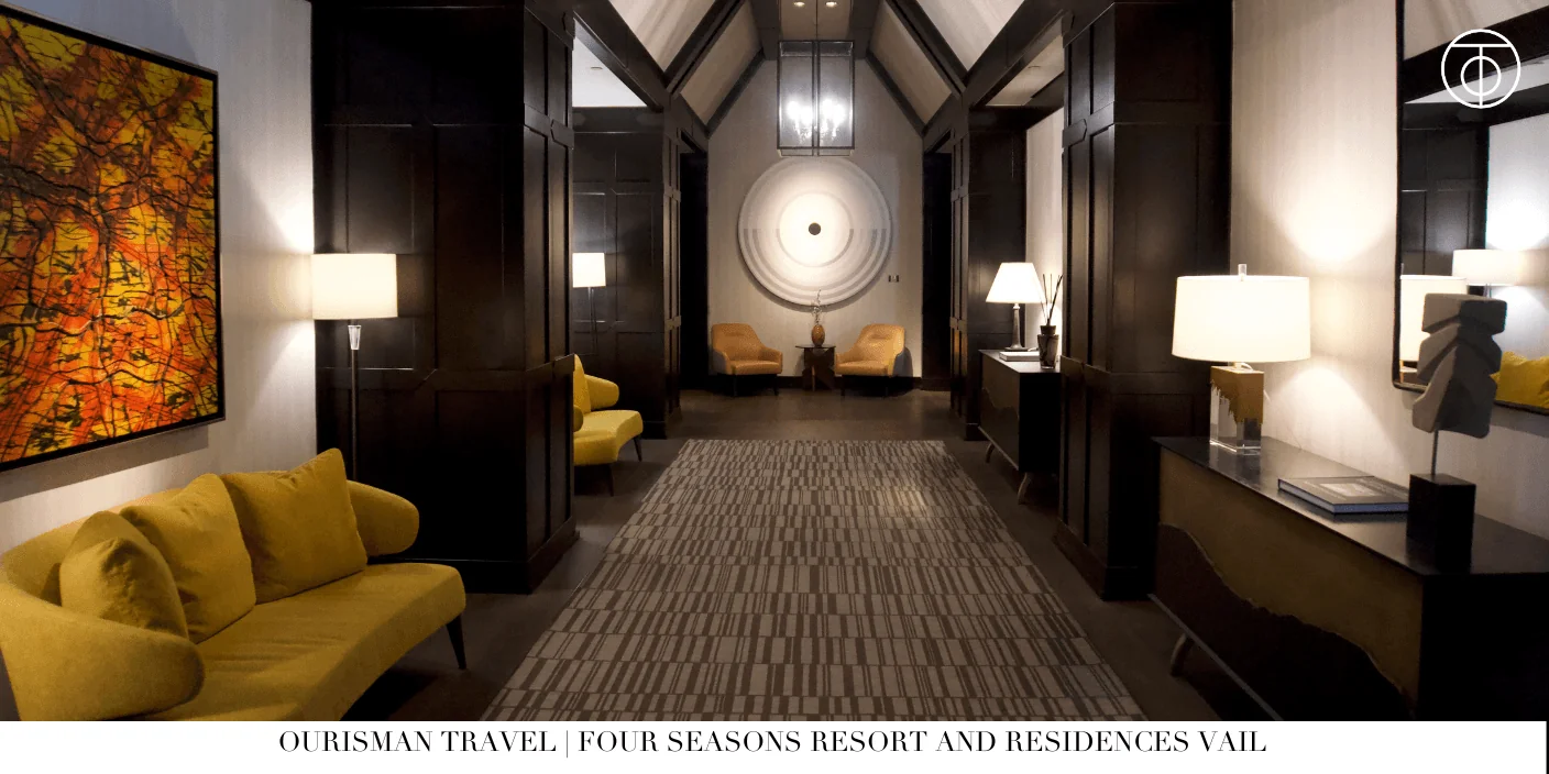 Four Seasons Vail lobby with vaulted ceilings and wood beams