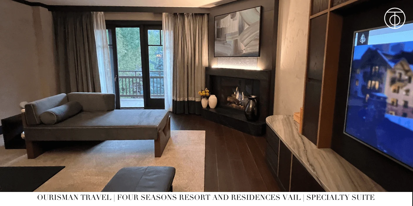 Fireplace seating area in Specialty One-Bedroom Suite Vail