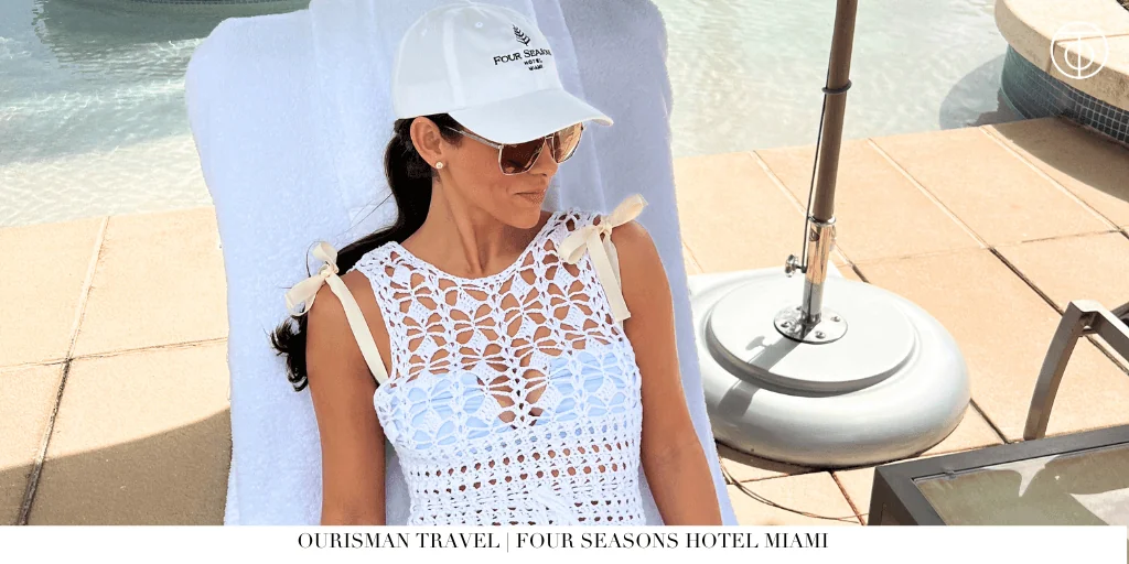 Guest relaxing poolside at Four Seasons Hotel Miami in Brickell.