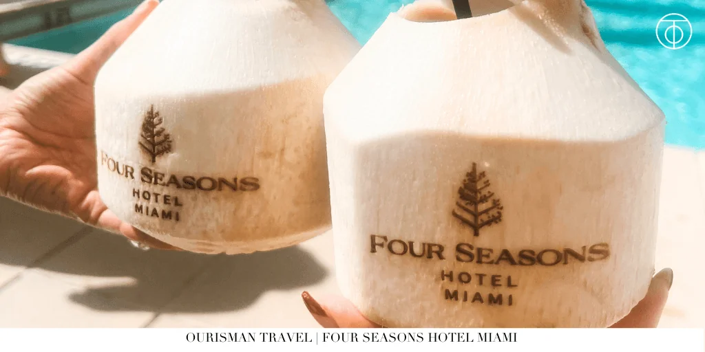 Fresh coconut drinks served poolside at Four Seasons Hotel Miami.