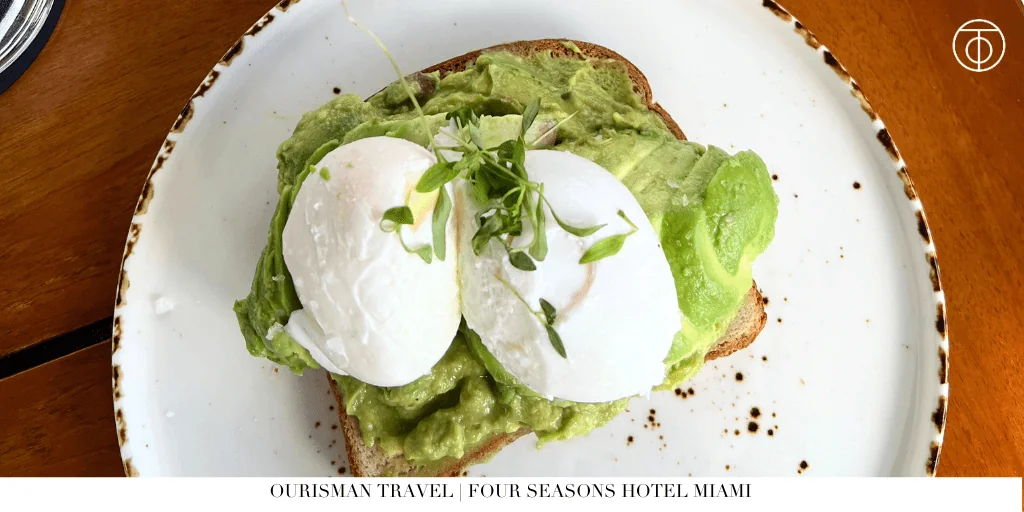 Avocado toast with poached eggs at Bahia Restaurant at Four Seasons Hotel Miami.