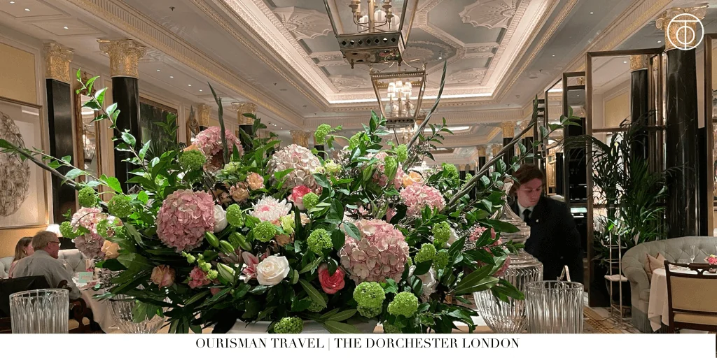 The Dorchester London lobby with floral arrangement