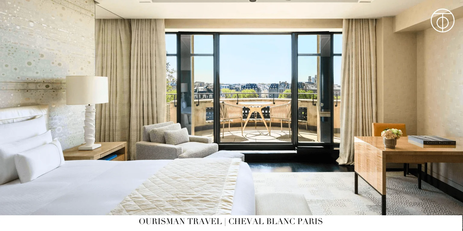 Cheval Blanc Paris bedroom with balcony and river view