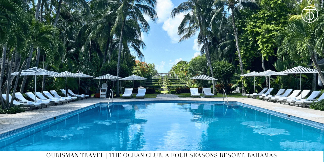 Four Seasons Ocean Club Bahamas pool with palm trees