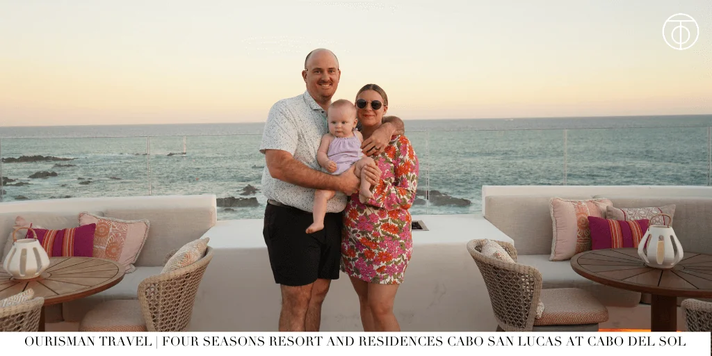 Family standing on an oceanfront terrace at Four Seasons Resort and Residences Cabo San Lucas at Cabo Del Sol