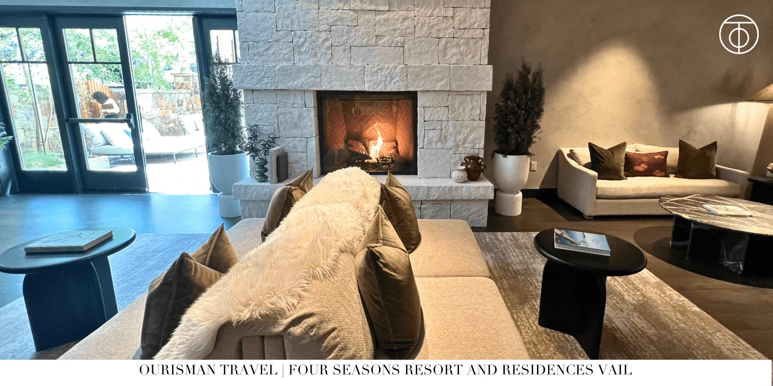 Luxury lodge living room with fireplace and seating