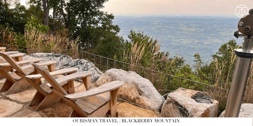 Wooden Adirondack chairs overlooking the Smoky Mountains at Blackberry Mountain