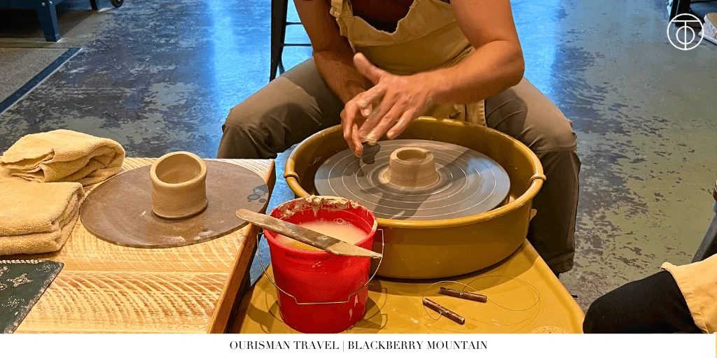 Guest using pottery wheel at Blackberry Mountain Tennessee