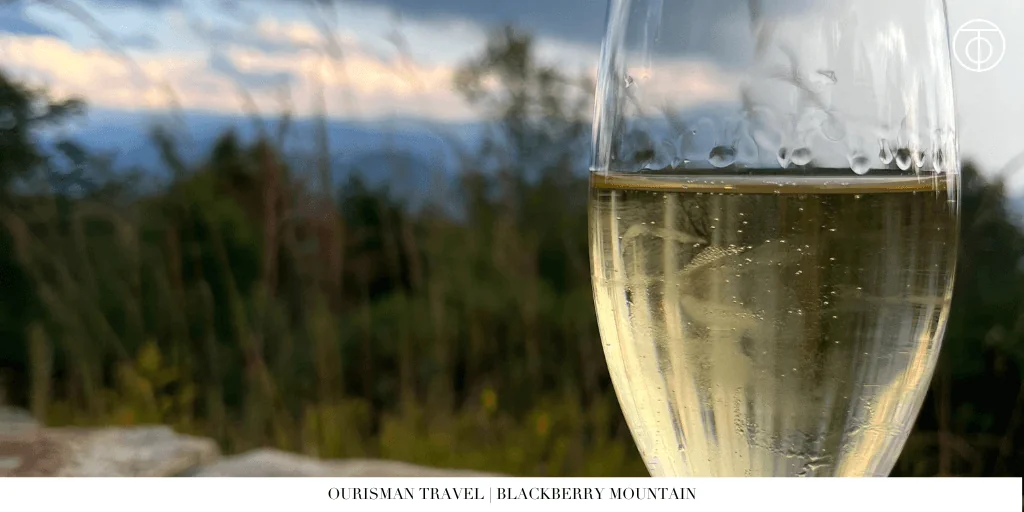 Glass of champagne with mountain view at Blackberry Mountain Tennessee