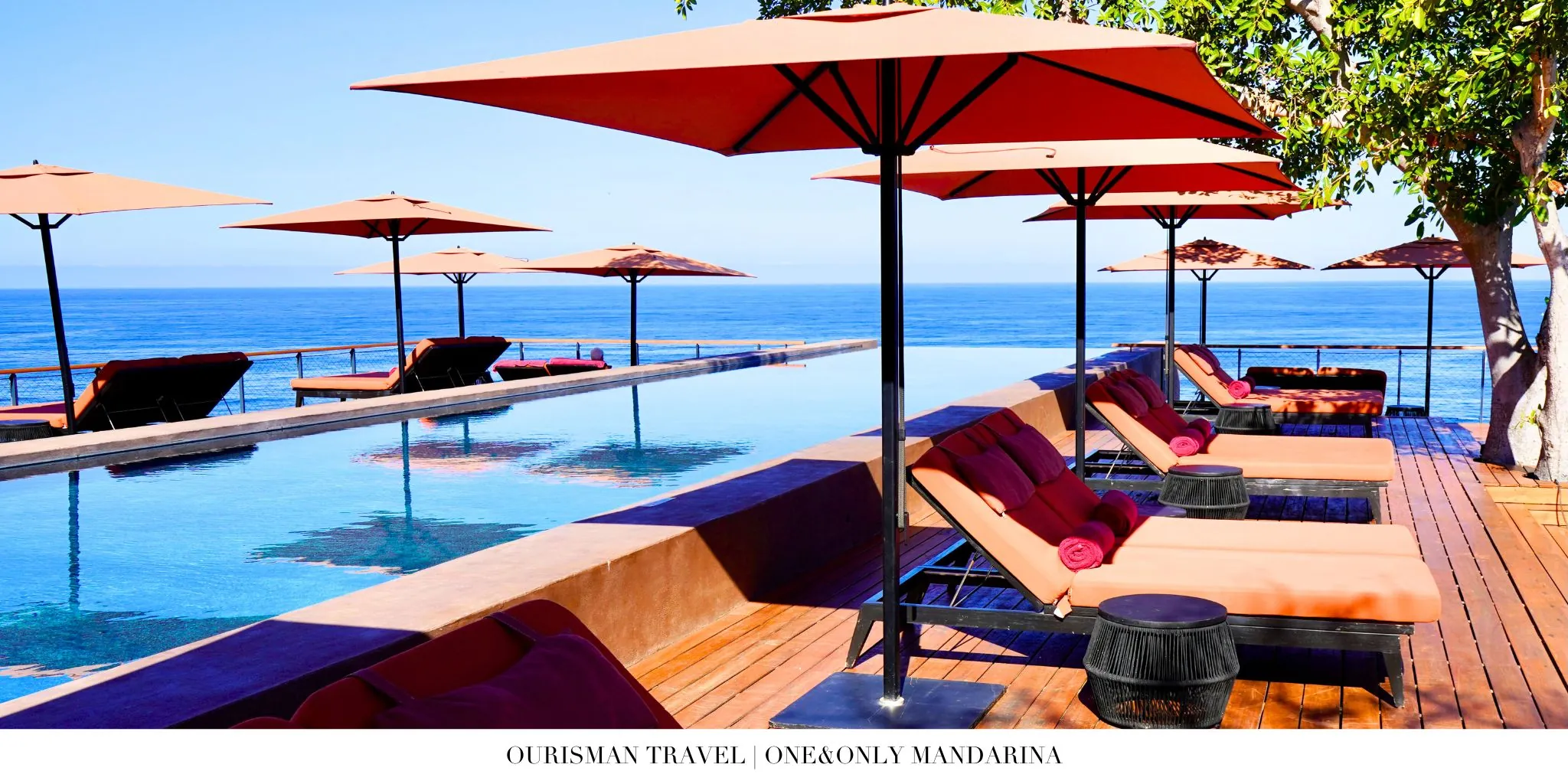 Infinity pool at One&Only Mandarina overlooking the Pacific Ocean and jungle cliffs